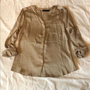 The Limited gold jewel tone blouse.